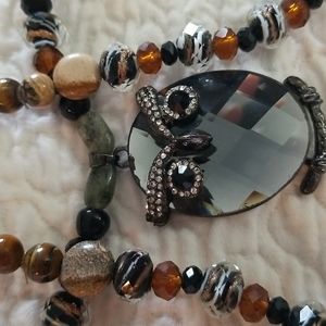 Rhinestone pendant stone (tiger's eye) and faceted